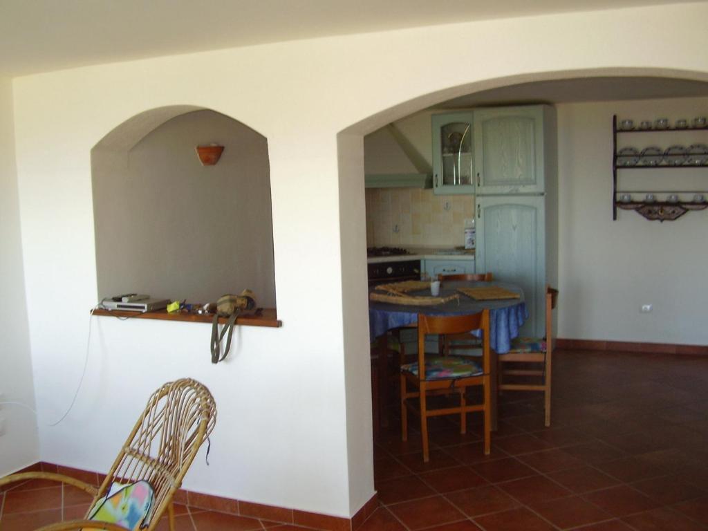 Bed and Breakfast Torre Del Pozzo S'Archittu Habitación foto